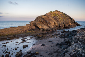Islet of Rosto do Cão in the twilight and low tide of the Atlantic Ocean in São Roque, São Miguel - Azores PORTUGAL
