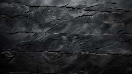 Close-up of black stone wall on dark background