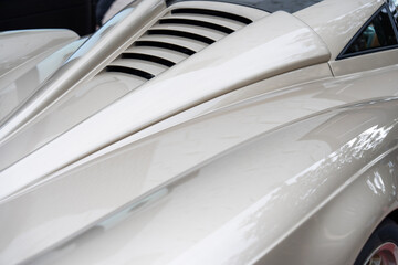 Close up of rare luxury car body with unique recognizable design. Italian automotive production...