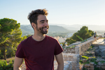 young man happy in the countryside