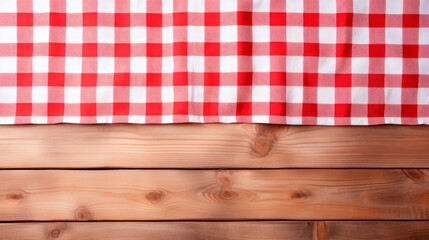 A red and white checkered tablecloth on a wooden table
