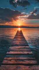 Obraz premium Sunset view from a wooden pier over a calm lake