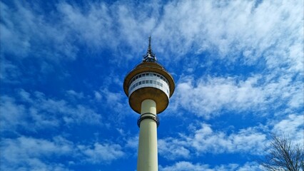 Bremerhaven - radar tower - fantastic view from below of the impressive tower with clouds passing by