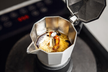 Brewing Espresso in Traditional Italian Moka Pot on Gas Stove, - 773001233