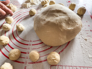 many small balls for dumplings, roll it for making vareniki