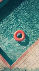 Fototapeta na wymiar Red lifebuoy in a swimming pool