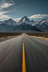 Naklejka premium An empty road with mountains in the background.