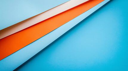 orange blue white colored piece of paper on top of another flat backgrounds