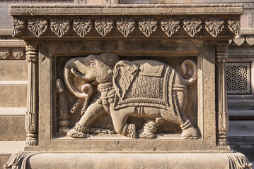 Beautiful stone carving of an elephant at Maheshwar temple situated on the banks of Narmada river, Madhya Pradesh, India. - Powered by Adobe