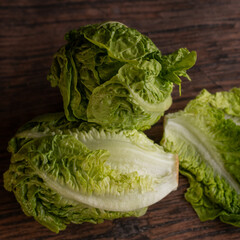 Roman lettuce against a rustic backdrop.