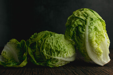 Roman lettuce against a rustic backdrop.