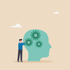 Skills concept, improve skills, improve work qualifications. A businessman adds new skills or equipment to a person's head to improve skills.
