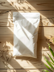 white packaging bag mockup on a wooden table