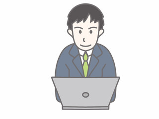 スーツを着てパソコンをしている男性