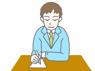 青いスーツを着て書き物をしている男性