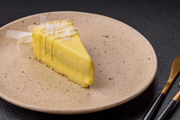 Delicious sweet cheesecake with fruits covered with icing with a wooden stick