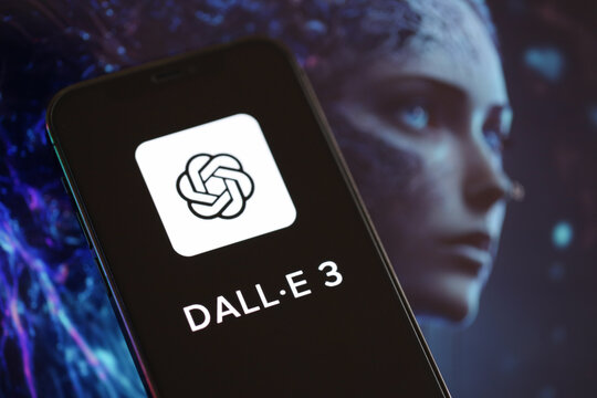 KYIV, UKRAINE - MARCH 17, 2024 Dall-E 3 logo on iPhone display screen with background of artificial intelligence futuristic ai generated image close up