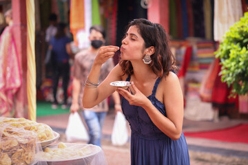 Woman Eating Pani Puri 

