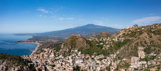 The hilltop town of Taormina with Mt Etna in the background