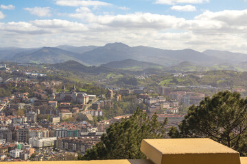 Naklejka premium Beautiful view from above on San Sebastian, Spain. Beautiful clouds and mountains in the distance