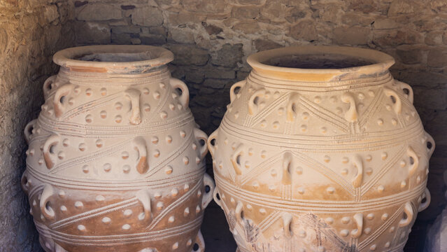 Minoan pottery. Two decorated pithoi or storage jars, at the Knossos palace. July 03, 2019. Crete, Greece