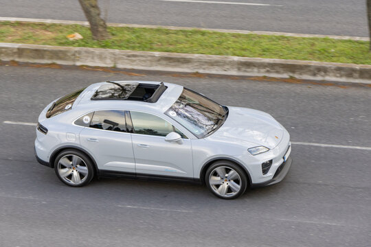 Lisbon, Portugal, March 25th 2024, SUV vehicle from the manufacturer Porsche new model Macan 4, 100% electric