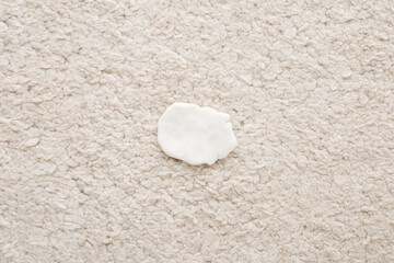 White chewing gum on light beige home carpet. Closeup. Top down view. - 773063269