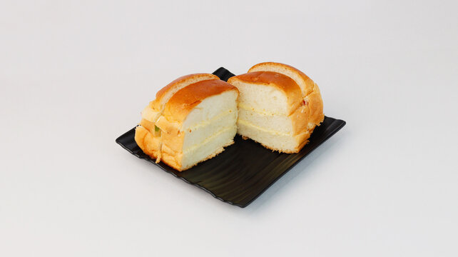 Bun with some maska, which is a mixture of butter and cream, Pune, Maharashtra, India
