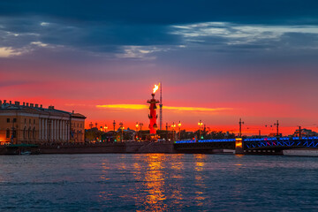 Rostral column in St. Petersburg. Fantastic sunset over the Neva River.