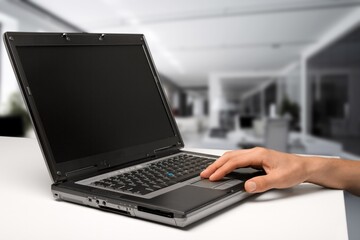 Fototapeta na wymiar Empty screen laptop on work table