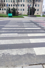 pedestrian crossing, white stripes on black asphalt, road markings zebra crossin - 773077238