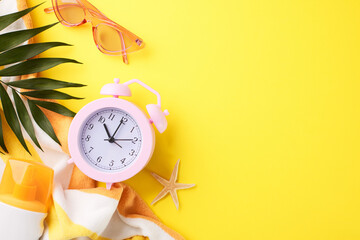 Morning summer vibes: Top view photo of colorful and energetic start with an alarm clock,...