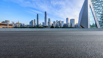 Asphalt road and modern city buildings in Guangzhou. Panoramic view. - obrazy, fototapety, plakaty