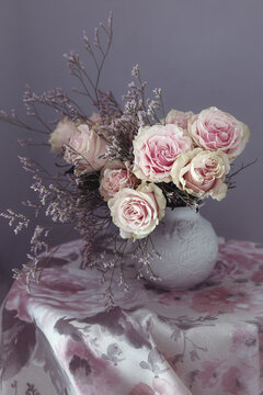 Beautiful fresh roses on a table. 