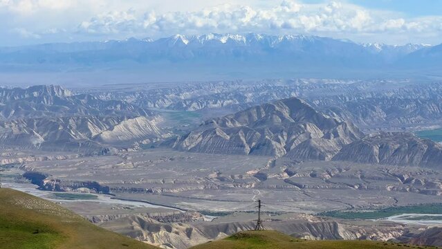 Toguz-Toro pass in Jalal-Abad region in western Kyrgyzstan. The Tien Shan and Pamir mountain systems. The highlands. View of the serpentine from the pass. 4К