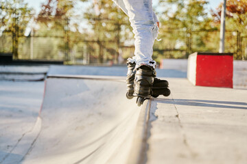 roller skater doing tricks. unrecognizable man skating in his spare time.