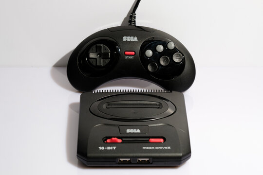 Newcastle UK: 21st Jan 2024: A closeup of a Sega Mega Drive II mini console. Retor gaming. Megadrive and 6 button controller