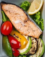 red fish steak and grilled vegetables