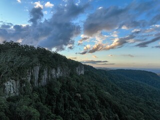 the landscape is alive with some beautiful colors and textures, and the surrounding mountains are