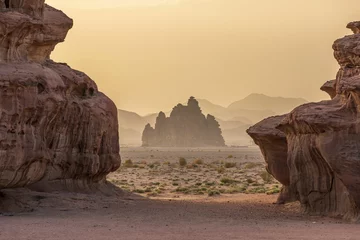 Fotobehang Picturesque desert landscape with rock formations of Tabuk, Neom at sunset © Wirestock
