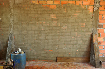 parede sendo rebocada rustica 