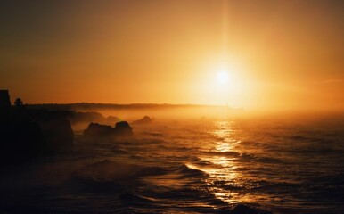 a very nice shot of a sun going down in the sky