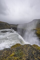 Gullfoss Waterfall in Iceland with a view of the canyon and water spray.