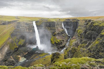 View from a side ledge on top of the valley of the Haifoss Waterfall in Iceland.