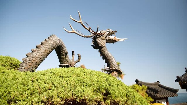 Dragon symbol at Haedong Yonggungsa Temple near Busan, South Korea. High quality 4k footage