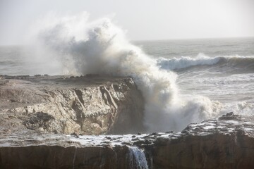Obraz premium Shot of Santa Cruz flooding in Jan 2023. Pleasure point, Capitola Wharf, and Steamer Lane
