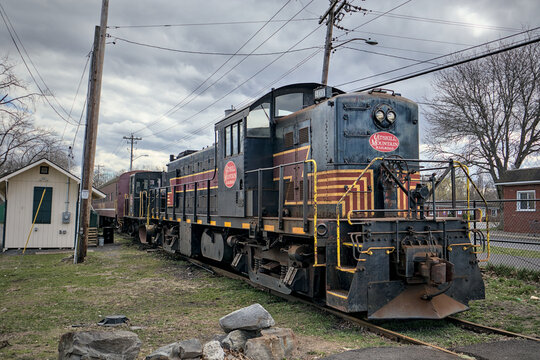Catskill Mountain Railroad tourist train car detail parked on a rail track.