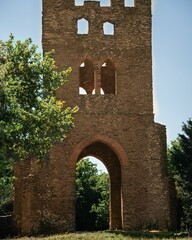 old structure with many windows and two towers on top of each other
