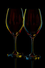White Wine Glasses silhouette over Black Background. - 773159485