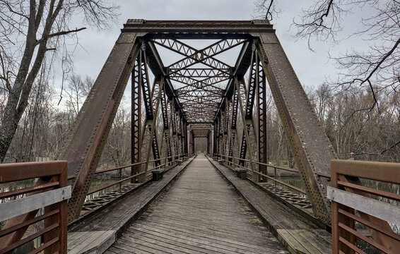 railway trestle bridge over wallkill river valley (springtown bridge in new paltz, new york) iron metal former railroad converted to rail trail and pedestrian path in hudson valley